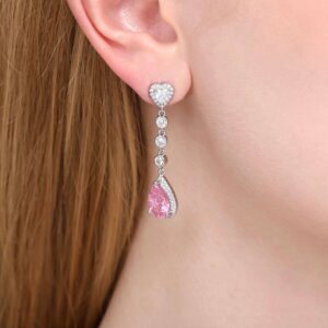 Pink teardrop drop earrings wearing effect