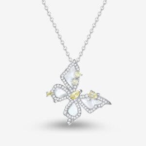 A silver necklace with a butterfly-shaped pendant, adorned with clear and yellow gemstones. The butterfly has intricately detailed wings and chain links are visible against a light background.