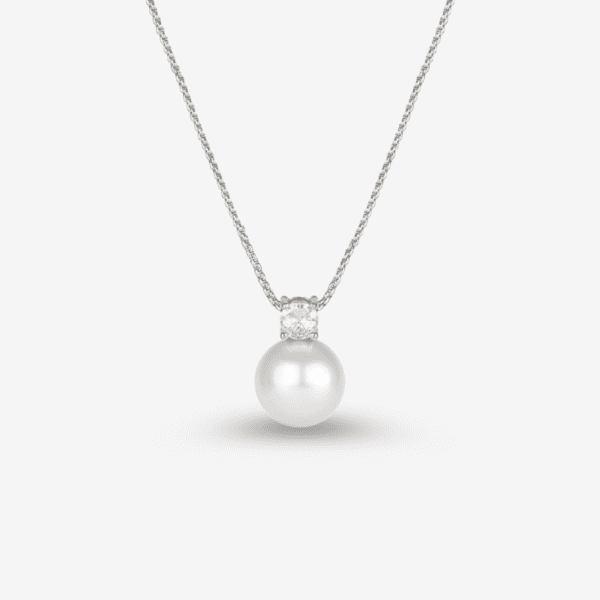 A silver necklace featuring a single, large white pearl pendant with a small diamond above it, displayed against a white background.